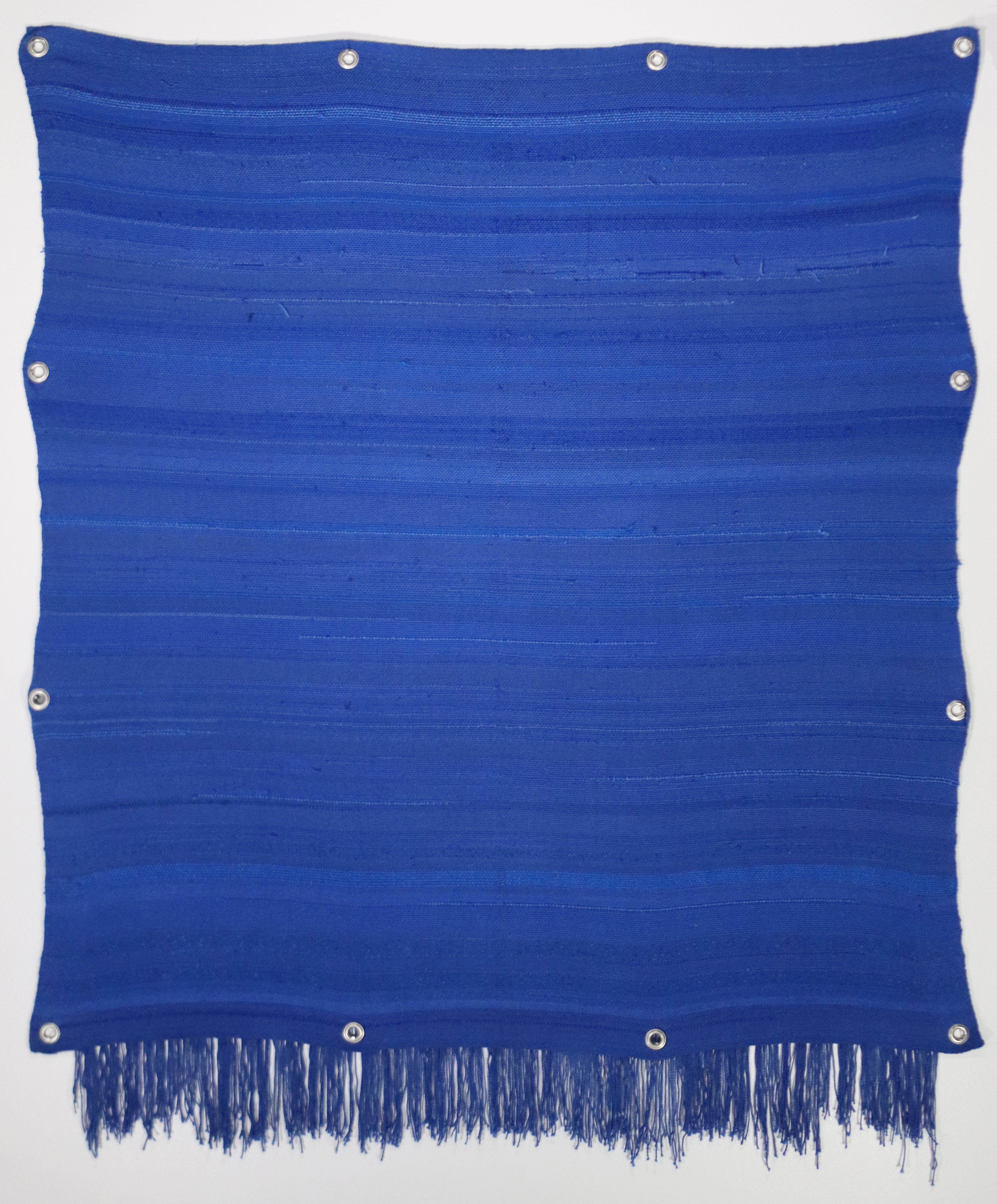 Wrap Yourself in Comfort, 2022, 48" x 47,” Handwoven cotton, acrylic, wool, hardware